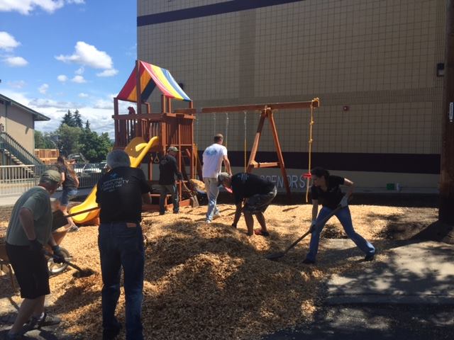 Windermere Spokane Valley agents working on a playground on Community service day