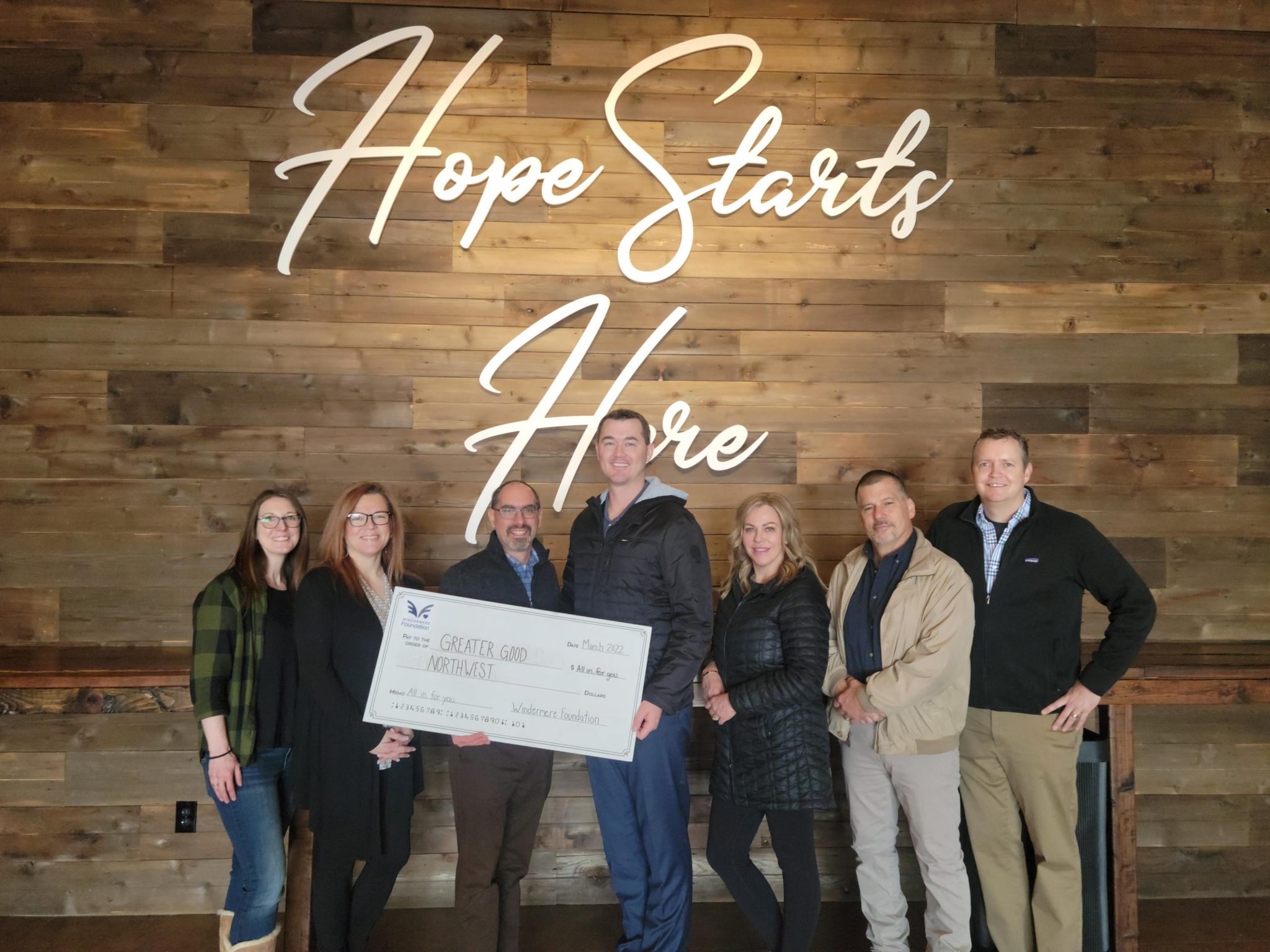 Greater-Good-Northwest with lifesize donation check