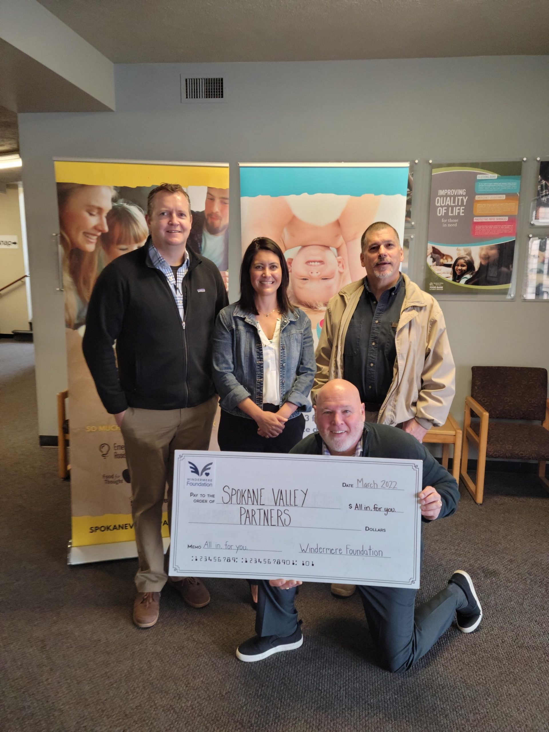 Spokane-Valley-Partners-organization with lifesize donation check