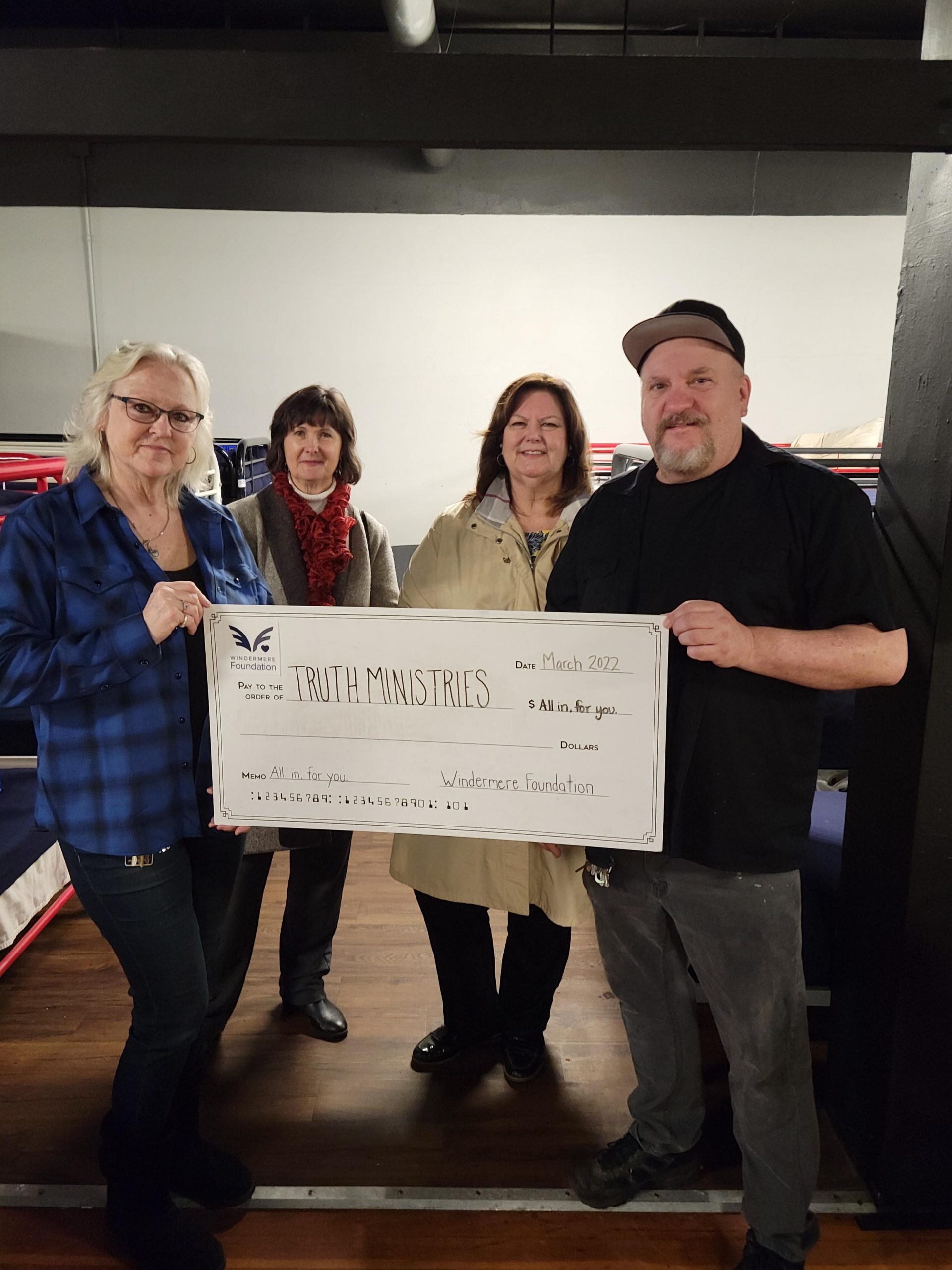 Truth-Ministries with lifesize donation check